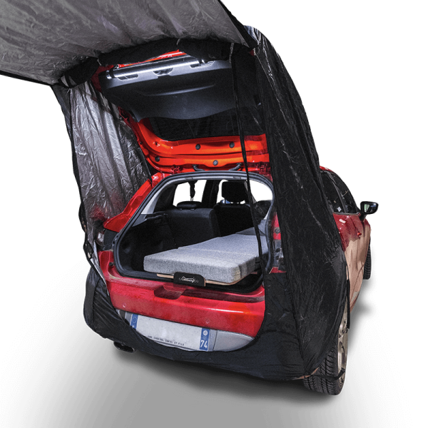 Tailgate tent attached to the rear of the vehicle