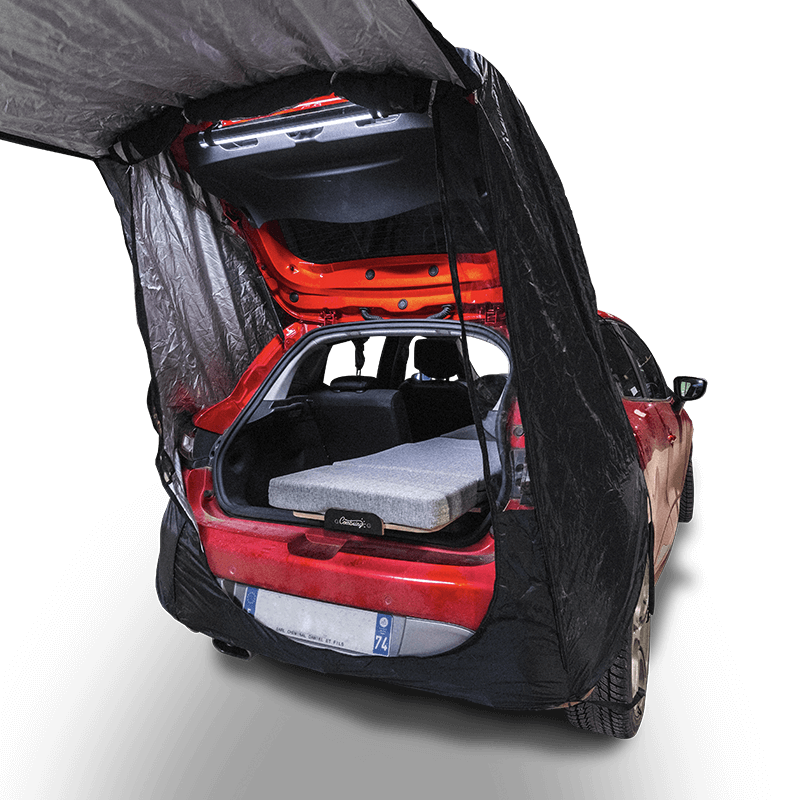 Tailgate tent attached to the rear of the vehicle