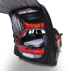 Tailgate tent attached to the rear of the vehicle